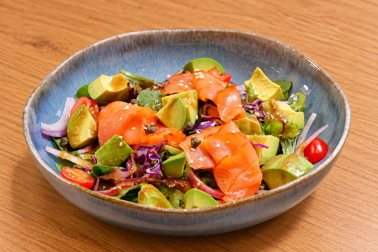 Avocado Salad topped with the optional salmon add-on.
